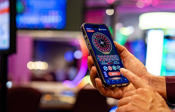 Domino QQ players enjoying the game on mobile during a holiday